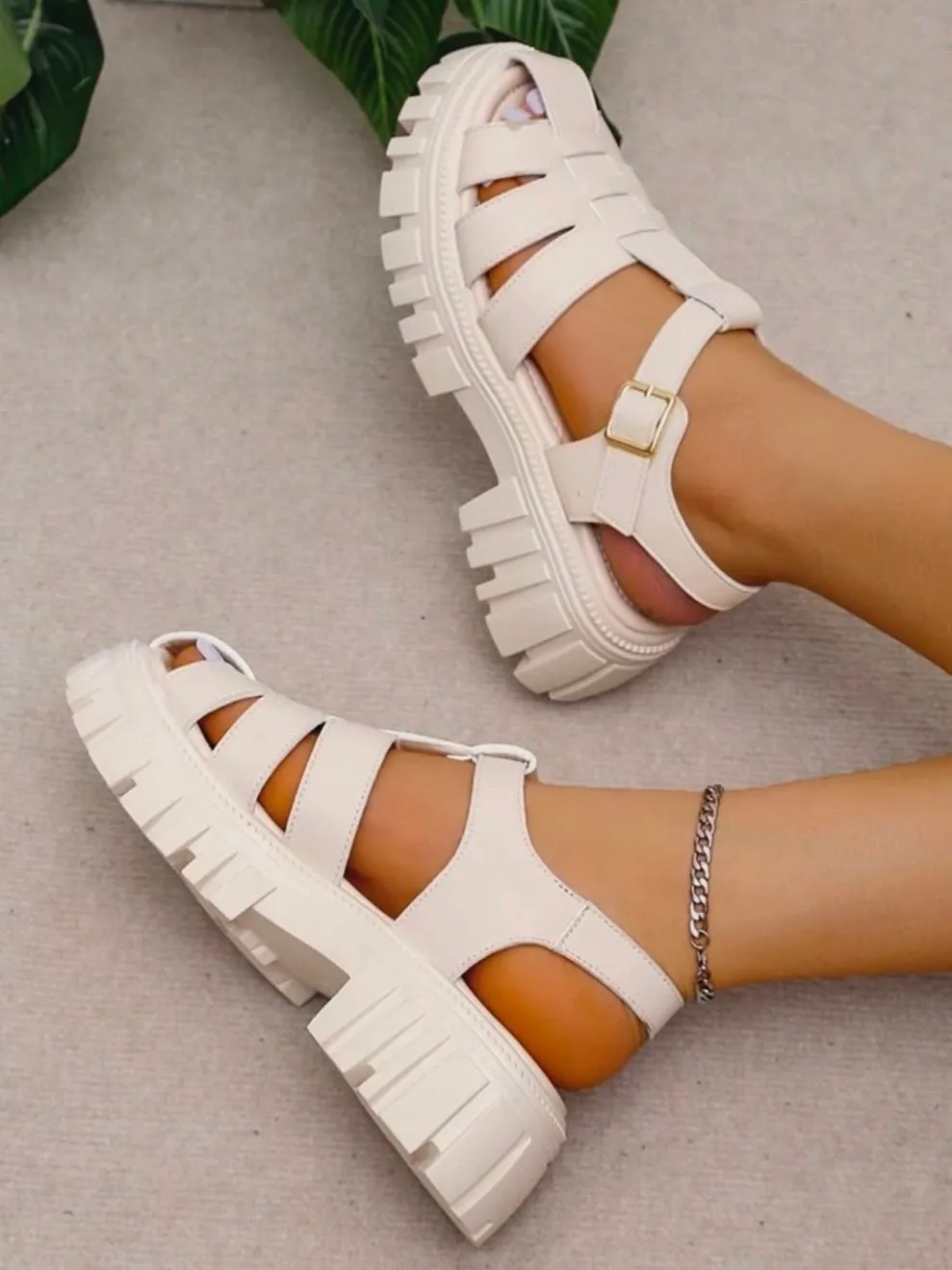 Beige plastic sandals